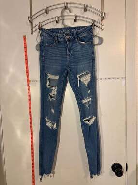 F: American Eagle Next Level Stretch Distressed Skinny Jeans